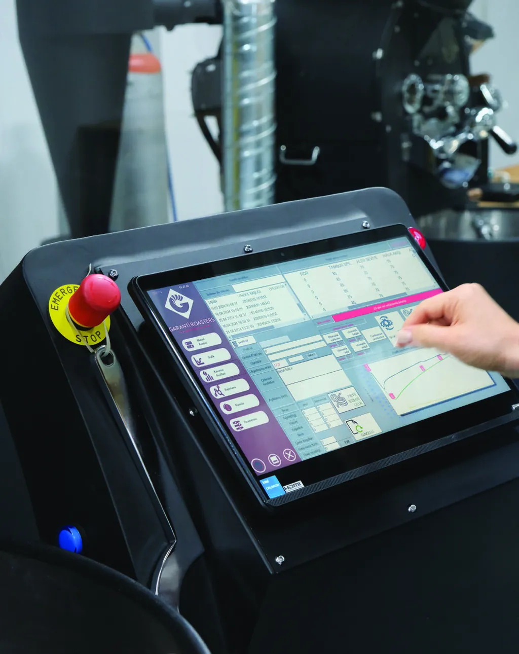 Operator using a touchscreen control panel on the ATLANTICA 120